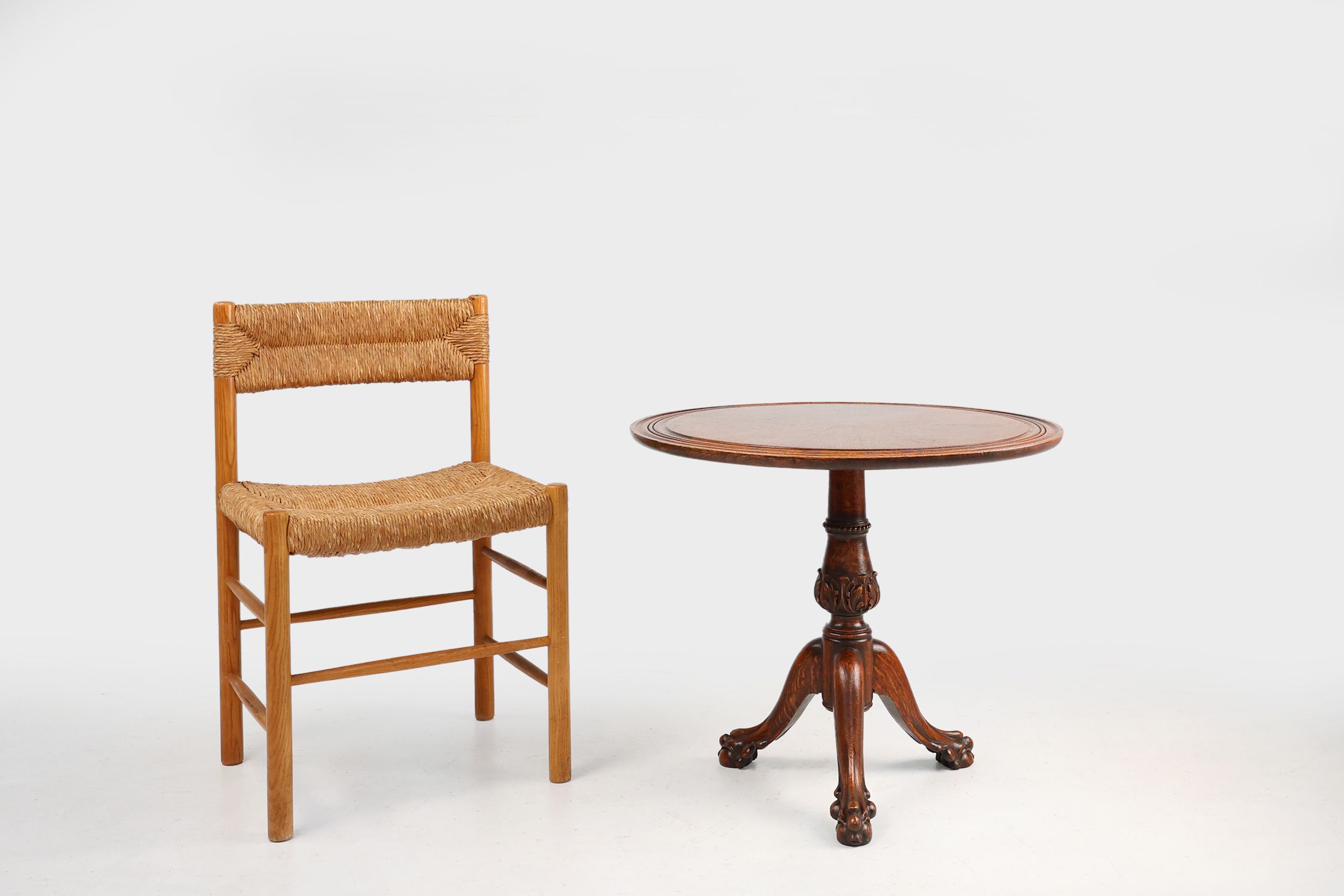 Antique English hand carved circular oak side table with lions head feet thumbnail